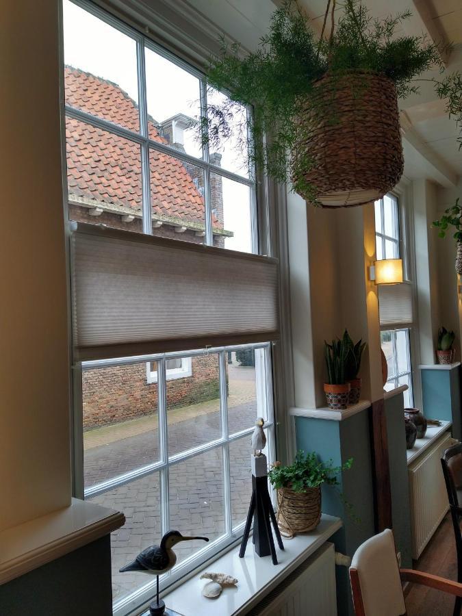 Bed & Brasserie Het Kosthuys Sint-Maartensdijk Exteriör bild